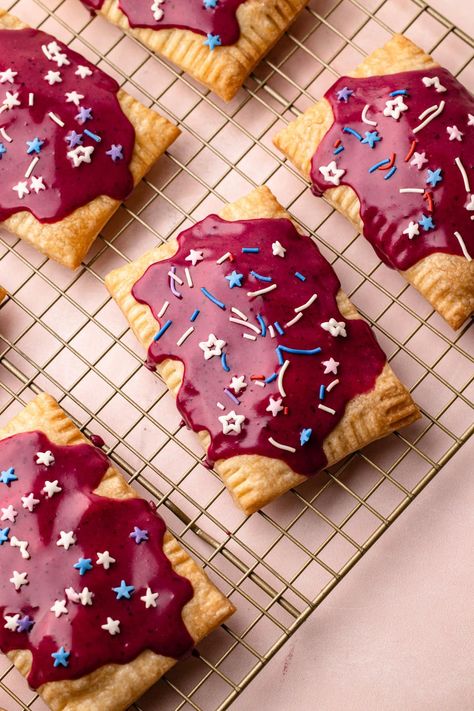 Experience the nostalgia with a grown-up twist: Homemade Wild Berry Pop-Tarts with a delicious sweet berry lime filling. Cherry Poptart Cookies, Pop Tart Aesthetic, Pop Tart Pie, Poptart Flavors, Homemade Pop Tarts Recipe, Homemade Poptarts, Chocolate Pop Tarts, Berry Pie Filling, Jumbo Cookies