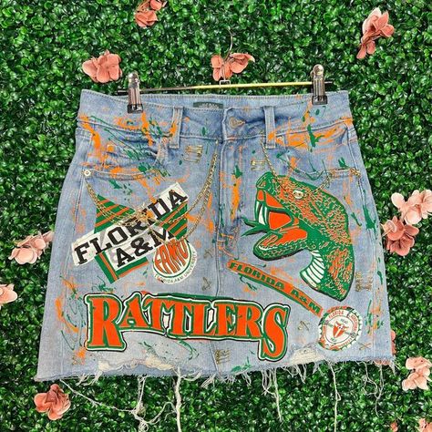 NORTHSIDE JAX | BOUTIQUE on Instagram: "Custom Famu Denim Skirt 🐍🧡 Any school can be fulfilled Send a dm for inquiries! @famu_1887" Custom 2 Piece Jean Outfit, Custom Denim Skirt Outfit, Painted Jeans School Spirit College, Famu Homecoming Outfits, Custom Skirt Denim, Custom Jean Skirt, Famu Decision Day, Custom Senior Outfits Skirt, Famu Game Day Fit