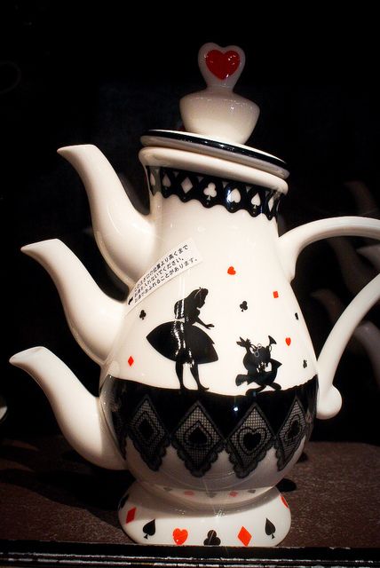 Alice in wonderland teapot. I hope only the real spout is the top, that way it would hold more. It would be hard to pour 3 cups at a time Alice In Wonderland Teapot, Tea Tattoo, Decoration Shabby, Alice In Wonderland Party, Mad Hatter Tea, Mad Hatter Tea Party, Teapots And Cups, Wonderland Party, Chocolate Pots