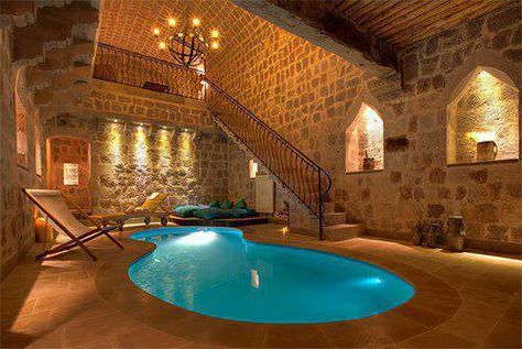 For my future castle... a dungeon pool, with a chandler suspended above it. Indoor Swimming Pool Design, Indoor Pool Design, Piscina Interior, Indoor Pools, Indoor Swimming Pool, Decor Ikea, Dream Pools, Beautiful Pools, Indoor Swimming