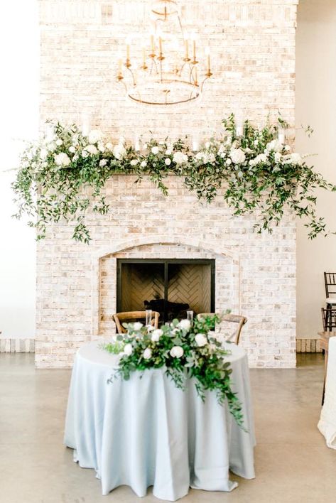 Brick Fireplace White, Mantel Floral Arrangements, Wedding Fireplace Decorations, Wedding Mantle, Brick Fireplace Wall, Fireplace White, Wedding Fireplace, Red Brick Fireplaces, White Brick Fireplace