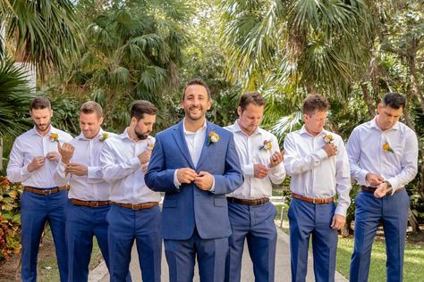 Tropical colorful boutonnieres with navy blue pants. Silk flowers for rent Cancun Riviera Maya and Tulum wedding Dreams Jade Cancun wedding Esteban Bahena Photography Blue Groomsmen Attire Casual, Blue And Tan Wedding Party, Groomsmen Outfits Casual, Groomsmen Attire Navy Blue, Blue Groomsmen Attire, Casual Groomsmen Attire, Groomsmen Attire Beach Wedding, Groomsmen Attire Navy, Navy Blue Groomsmen