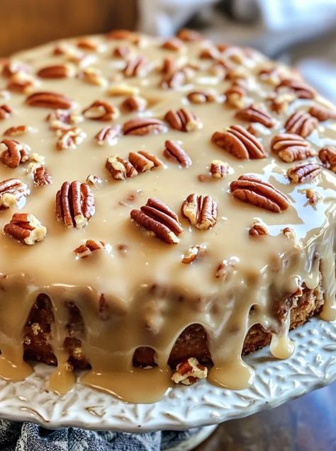 Butter Pecan Praline Poke Cake Recipe Pecan Praline Icing Recipe, Butter Pecan Praline Pound Cake, Southern Praline Pecan Poke Cake, Southern Pecan Praline Sheet Cake, Pumpkin Praline Cake, Butter Pecan Cake Mix Ideas, Butter Pecan Praline Poke Cake Recipe, Pecan Cake Filling, Butter Pecan Praline Cake