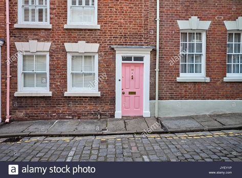 Download this stock image: Pink front door in Georgian house, Chester - JYEY1P from Alamy's library of millions of high resolution stock photos, illustrations and vectors. Exterior House Options, 1910 House, Brick Exteriors, Red Brick Exteriors, Pink Front Door, Georgian House, Red Brick House, Pink Door, Exterior Front Doors