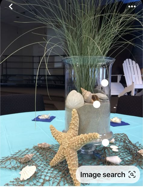 Starfish Centerpiece Ideas, Beach Retirement Party Decor, 60th Birthday Beach Theme, Under The Sea Decorations Centerpieces, Outdoor Ocean Party Decorations, Under The Sea Center Piece Ideas, Coastal Dinner Party Table Settings, Beach Themed Centerpieces Diy, Beach Theme Dinner Table