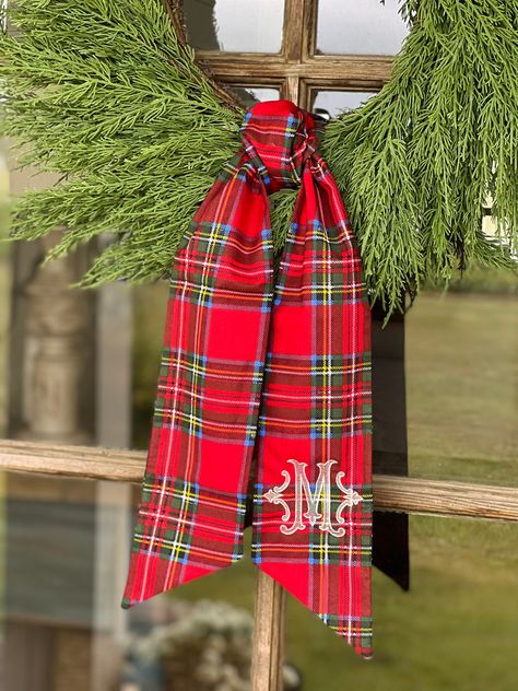 "Decorate your front door wreath with a  sash.   This wreath has the elegant monogram in ivory colors.  Plaid Sashes come in one length of 50\" *4.5\" width *Machine Washable *100% cotton * Font shown is Romanesque" Tartan Plaid Christmas, Monogrammed Linens, Plaid Christmas Decor, Wreaths For Sale, Christmas Monogram, Plaid Ribbon, Office Christmas, Monogram Wreath, Merry Little Christmas