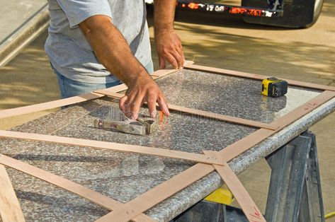 Granite Countertop Measurement. A contractor measures granite for use in a kitch , #AFFILIATE, #Measurement, #contractor, #Granite, #Countertop, #kitchen #ad Old Granite Countertops, Quartz Vs Granite Countertops, Quartz Vs Granite, Granite Installation, Refinish Countertops, Types Of Granite, Natural Stone Countertops, Stone Counters, Black Countertops