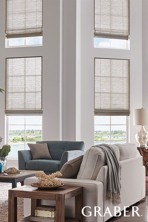 When windows are out of reach, motorized shades just make sense. Tall Window Treatments, Graber Blinds, Custom Window Blinds, Window Treatments Living Room, Woven Wood Shades, Tall Windows, Bamboo Shades, Custom Window Treatments, Living Room Windows