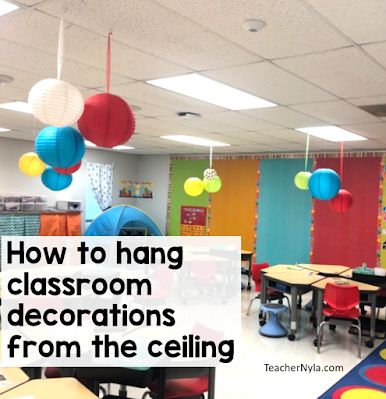 Classroom Garland Ideas, Hanging Things From Ceiling In Classroom, Hang From Ceiling Decor Classroom, Hanging Art From Ceiling Classroom, Ceiling Classroom Decorations, Paper Lanterns Classroom Decor, How To Hang Decorations From Ceiling, Classroom Hanging Decorations Ceilings, Hanging Decorations From Ceiling