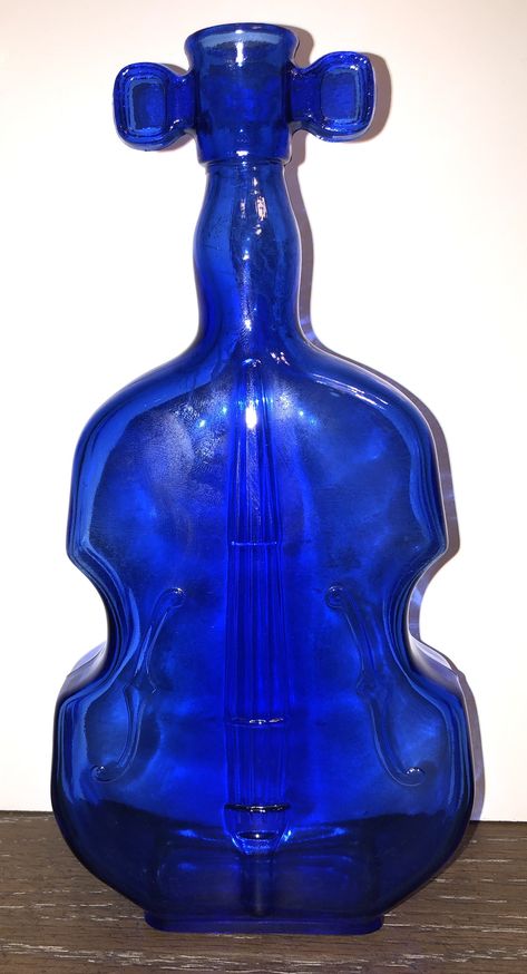 "Cobalt Blue Glass Vase, Vintage Violin Vase, Viola Bass Fiddle Vases. Glass Vase Musical Instrument Imperial Blue Violin Vase is 9 1/2\" tall x 3 3/4\" wide x 2 1/2\" deep, the blue is in the cobalt family not a light blue, this piece is has a couple of little spots on the inside, no water spots, no chips or cracks or scratches, this one was made as a vase for sure, it's all blue I do combo ship" Glass Violin, Vintage Cottage Decor, Vintage Violin, Art Glass Ornaments, Colored Glass Vases, Glass Store, Blue Glass Bottles, Blue Glass Vase, Cobalt Glass