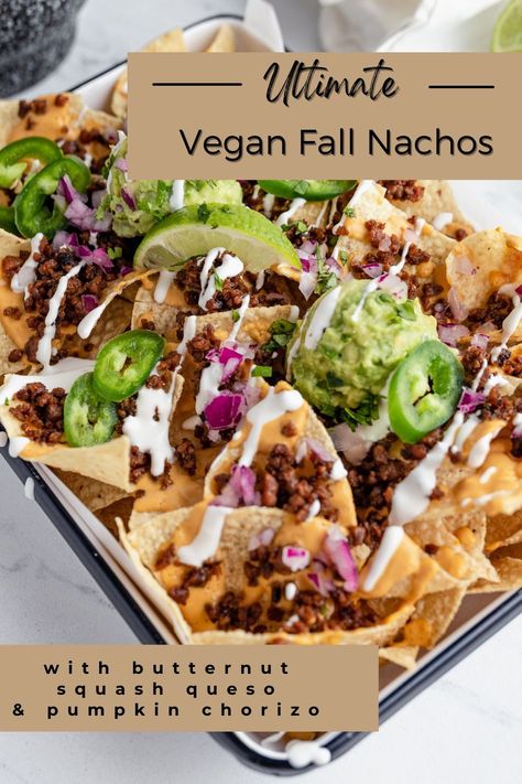 These Vegan Fall Nachos make the ultimate platter for this time of year. Crunchy tortilla chips topped with smoky, creamy butternut squash queso and homemade pumpkin chorizo. Add your favorite toppings to make the perfect autumn appetizer that will impress even the harshest nacho critics out there! #vegannachos #veganfallnachos #butternutsquashqueso Fall Nachos, Autumn Appetizer, Pumpkin Chorizo, Healthy Hearty Meals, Creamy Butternut Squash, Vegan Queso, Vegan Cheese Recipes, Fall Vegan Recipes, Vegan Party Food