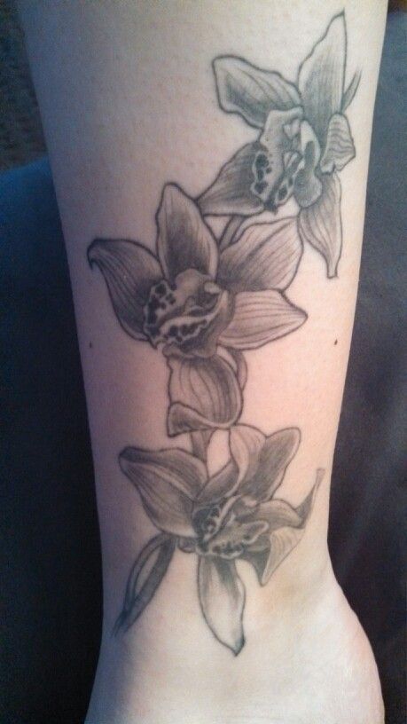 My cymbidium orchid tattoo :) Cymbidium Orchid Tattoo, Cymbidium Orchids Tattoo, Orchid Memorial Tattoo, Orchid Stamp Tattoo, Orchid Flower Tattoos Black And White, Large Orchid Tattoo, Thigh Piece, Orchid Tattoo, Arm Tats