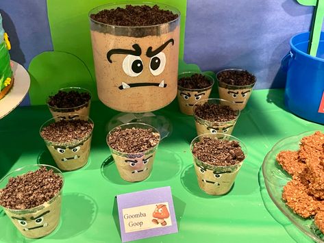 Mario Party Dessert Ideas, Goomba Pudding Cups, Mario Dessert Ideas, Super Mario Bros Dessert Table, Super Mario Desserts, Mario Dessert Table, Mario Themed Snacks, Mario Food, Super Mario Bro