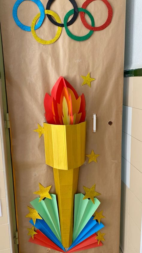 Olympics Door Decor, Olympic Party Decorations Diy, Olympic Float Ideas, Olympic Theme Classroom Decorations, Olympic Games Party Decorations, Olympics Decorations Ideas, Olympic Themed Bulletin Board, Olympic Vbs Decorations, Olympics School Theme