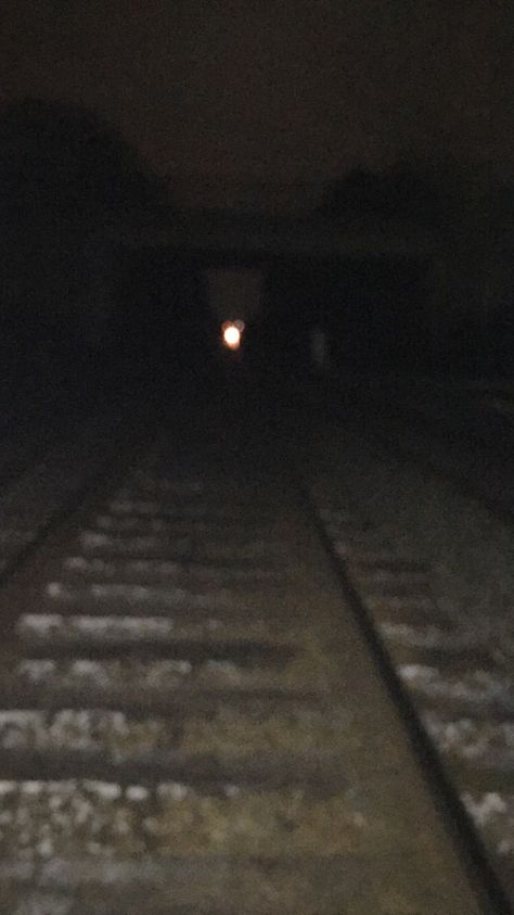 Train Tracks at night with a train light in the distance | Photograph by Yolanda Stape Off The Rails Aesthetic, Train Tracks At Night, Night Train Aesthetic, Train Tracks Aesthetic, Train At Night, Train Night, Midnight Walk, Train Light, Old Abandoned Buildings