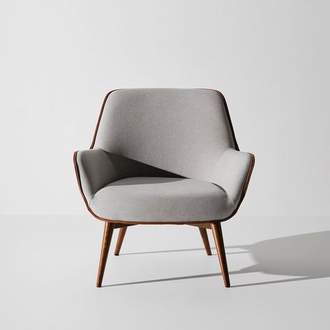 Nuevo on Instagram: “The Gretchen occasional chair is immediately recognizable, thanks to its unique design and high-contrast piping.” Adjustable Stool, Occasional Chair, Stone Grey, Contrast Piping, Fabric Seat, Inspired Living, Grey Chair, Slate Grey, High Contrast