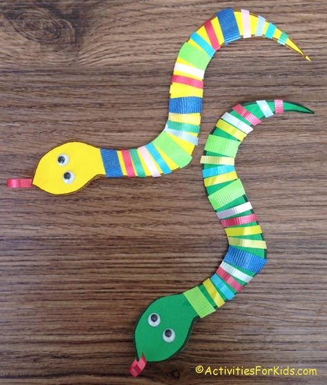 Easy and inexpensive to make, ribbon snake for making a St. Patrick's Day craft or a craft for the Chinese New Year.  Great for Bible study craft for Adam and Eve. Each student can create a unique snake with colorful ribbon. Snake printable at ActivitiesForKids.com Zodiac Bookmarks, Adam And Eve Craft, Adam And Eve Bible, Reptile Crafts, Snake Craft, Bible Study Crafts, Snake Crafts, Study Craft, Chinese New Year Crafts