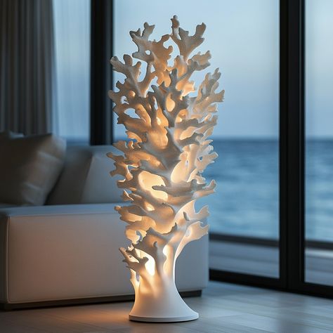 This coral-inspired lamp features a stunning design that captures the intricate beauty of underwater coral formations. The lamp’s base is crafted to resemble branching coral, with each delicate branch creating an organic, flowing silhouette. The soft, warm light diffuses through the carefully sculpted coral patterns, casting mesmerizing shadows that evoke the serene ambiance of an ocean reef. Ideal for adding a touch of nature to any space, this lamp blends artistry and functionality, making ... Organic Lamp, Hamptons Lifestyle, Angel Sculpture Art, Coral Lamp, Light Bulb Crafts, Ceramic Pendant Light, Ocean Reef, Coral Decor, Clay Moulding