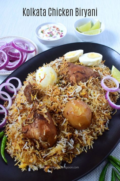 bengali chicken biryani recipe, kolkata chicken biryani, kolkata style chicken biryani, kolkata chicken biryani recipe, bengali chicken biryani, recipe of kolkata chicken biryani, chicken biryani bengali style, bengali style chicken biryani, kolkata style chicken biryani recipe, kolkata arsalan chicken biryani recipe, kolkata biryani, kolkata biryani recipe, kolkata biryani masala, kolkata arsalan biryani, bangla chicken biryani recipe, authentic kolkata chicken biryani recipe Kolkata Biryani, Bengali Chicken, Saffron Milk, Chicken Biryani Recipe, Golden Spoon, Popular Dishes, Chicken Biryani, Chicken Pieces, Biryani Recipe