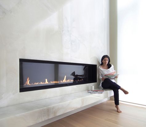 Heating unit recessed into the wall has a remote control that turns the system on and off, adjusts flame height to six different settings, and controls the output of heated air output into the surrounding room.     ￼ Contemporary Fireplace Designs, Fireplaces For Sale, Contemporary Stairs, Linear Fireplace, Contemporary Fireplace, Indoor Fireplace, Home Fireplace, Modern Fireplace, Fireplace Design