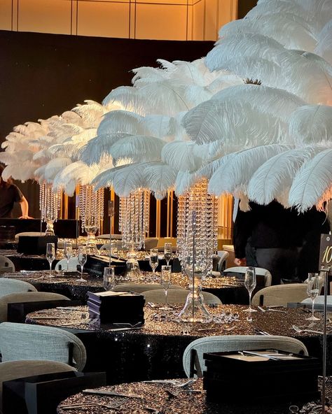 Indulge in feathered charm with our exquisite table centerpieces! ✨ Let your event take flight with our stunning creations. • • • #weddingdecor #weddinginspiration #weddinglosangeles #tablestyling #tablescape #tablecenterpiece #ostrichfeathers #ostrichfeathercenterpieces #feathercenterpiece #specialeventrentals #rentfeathers #roaring20s #oldhollywood Roaring 20s Centerpieces, Feather Centerpiece Wedding, Ostrich Feather Centerpieces, Feather Centerpieces, Floral Installations, Dream Wedding Decorations, Feather Decor, Feather Wedding, Wedding Prep