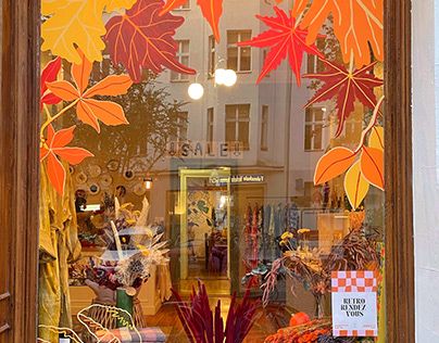 Fall Bookstore Window Display, Fall Window Mural, Fall Windows Display, Autumnal Window Art, Fall Storefront Window Display, Window Display Painting, Book Store Window Display, Fall Window Painting Store Fronts, Bookstore Organization