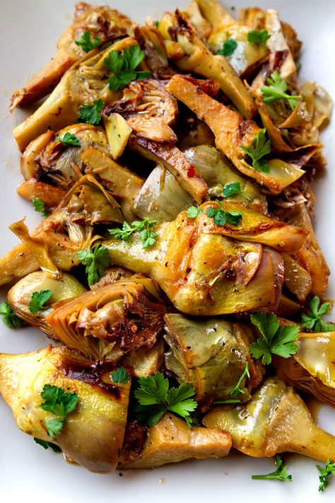 This simple method of cooking fresh artichokes really enhances their flavor. Artichoke Italian Recipes, Raw Artichoke Recipes, Fresh Artichoke Recipes Simple, Fresh Artichokes Recipes, Archichoke Recipe, Mediterranean Artichoke Recipes, Fresh Italian Recipes, Italian Artichoke Recipes, French Vegetable Recipes