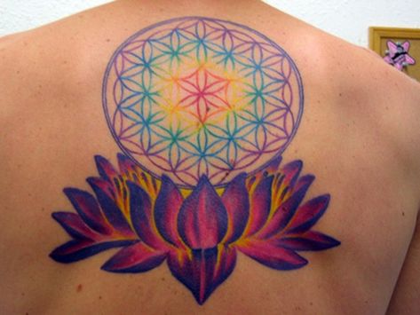 Colorful flower of life in lotus tattoo on backlotus-tattoo Lotus Tattoo Meaning, Circle Tattoo Design, Black Lotus Tattoo, Lotus Flower Tattoo Meaning, Flower Of Life Tattoo, Best Tattoo Ever, Flower Tattoo Meanings, Rainbow Tattoos, Circle Tattoo