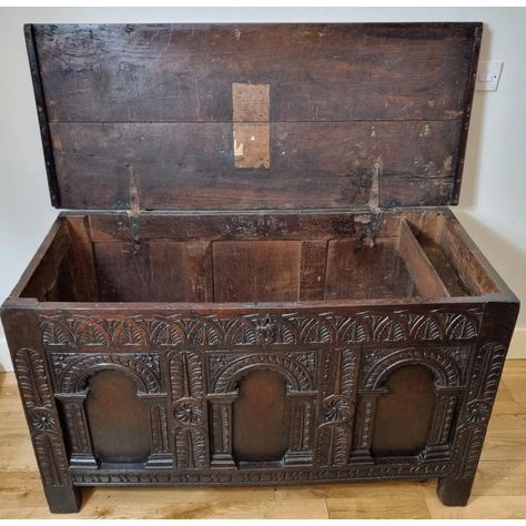 Elizabethan carved oak chest , Circa 1580 . exceptional colour and patination ,   retaining all its original boards , three arcaded panels with carved decoration . A lovely chest in very good antique condition.   130 cm w x 55.5 cm d x 75 cm h Skyrim Home Decor, Academia Interior, Dark Academia Interior, Antique Trunks, Antique Oak Furniture, Kubler Ross, Trunk Chest, Medieval Decor, Medieval Furniture