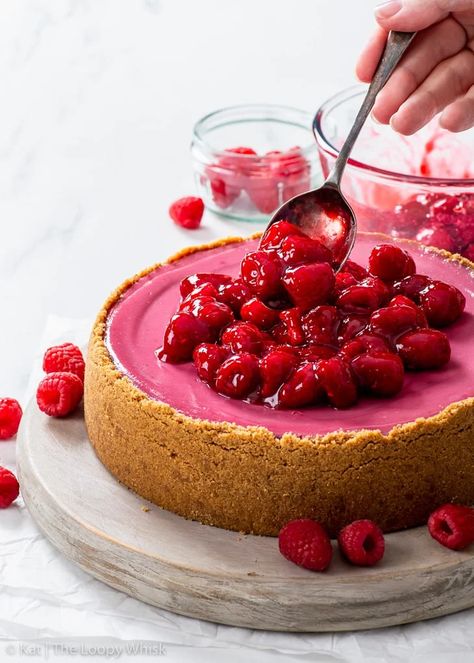 Easy Baked Raspberry Cheesecake - You’ll love this incredibly rich and creamy baked raspberry cheesecake. It has the most amazing intense raspberry flavour and the raspberry sauce it a total revelation, adding a wonderful tangy freshness and transforming the cheesecake into a truly unforgettable dessert. It’s also incredibly easy to make, no water bath and no stand or hand mixer needed! Easy cheesecake recipes. Raspberry dessert. No water bath cheesecake. Berry desserts. Summer recipes. Cheesecake Recipes Raspberry, Water Bath Cheesecake, Baked Raspberry Cheesecake, Gluten Free Vegan Recipes Desserts, Raspberry Dessert, Raspberry No Bake Cheesecake, Berry Desserts, Desserts Summer, Raspberry Desserts