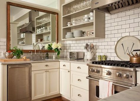 No Window Over the Kitchen Sink? Hang a Mirror! — Good Ideas for Rental Kitchens | The Kitchn Kitchen Sink Wall No Window, Windowless Kitchen, Ivory Kitchen Cabinets, Kitchen Sink Wall, Over The Kitchen Sink, Ivory Kitchen, Rental Kitchen, Subway Tiles, Shaker Kitchen