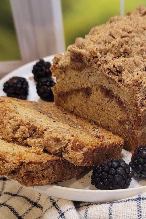 Banana bread slice on a plate Banana Bread With Strudel Topping, Banana Bread With Streusel Topping, Banana Bread With Streusel, Strudel Topping, Cinnamon Swirl Banana Bread, Super Moist Banana Bread, Flours Banana Bread, Banana Bread Ingredients, Homemade Breads