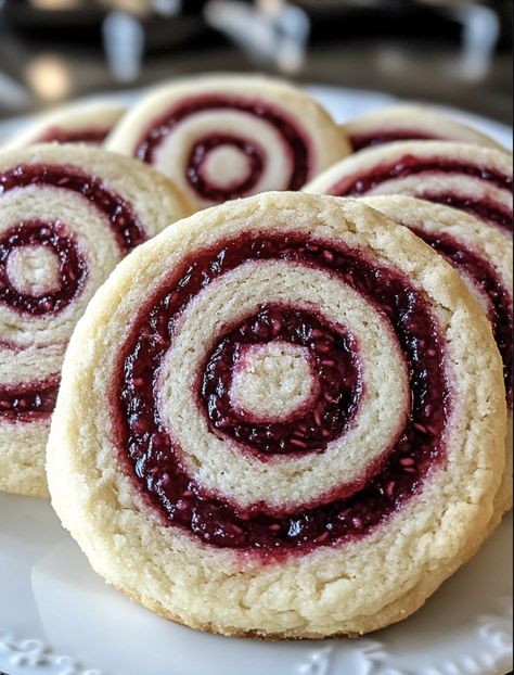 Raspberry Swirl Shortbread Cookies Recipe Cookies With Raspberry Filling, Strawberry Pretzel Dessert Cookies, Shortbread Swirl Cookies, Short Bread Cookies With Jam, Raspberry Swirl Shortbread, Cookies With Score Bits, Swirl Cookies Christmas, Raspberry Crinkle Cookies, Swirl Cookies Recipe