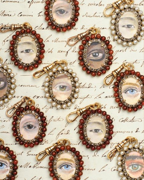 The lovers eye pendants featuring detailed hand-painted eyes, evoke the elegance and intrigue of the Georgian era, making them timeless keepsakes for those captivated by romance and historical charm. ⁠ ⁠ Create a custom look with pearls, carnelian beads, or rose quartz with the help of our staff and local painters! Lovers Eyes, Georgian Era, Modern Muse, Carnelian Beads, Custom Painting, Glass Frame, Antique Textiles, Eye Pendant, The Lovers