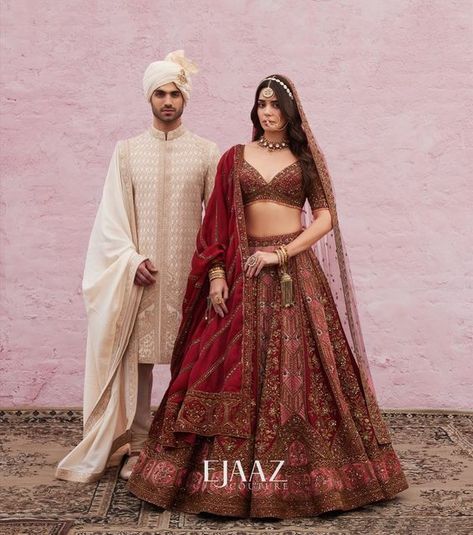 Ejaaz Couture on Instagram: "Breathing in a ton of cultural hues and ethnicities, our bride and groom are ready to invite you to their world where the most beautiful moments are found. Homage to heritage, Crafted for the new age and Curated with love ~ Our bridal couture treasure ~ Humsafar Collection available at the Flagship Store. — Shop with us: ⚜️at our Flagship Store : D 33, First Floor, Defence Colony, New Delhi - 110024 ⚜️Whatsapp : +91-9873789288 ⚜️Website : Link in the bio ⚜ Bride And Groom Indian Wedding Outfit, Payal Keyal, Maroon Bridal Lehenga, Latest Bridal Lehenga Designs, Winter Wedding Outfits, Bride And Groom Outfits, Bridal Lehenga Designs, Latest Bridal Lehenga, Wedding Lehenga Designs