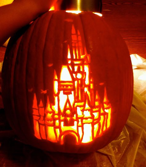 My Cinderella Castle jack-o-lantern! It took me HOURS to carve this last Halloween, but it was so worth it! It got third place in the BoardWalk Resort's pumpkin carving contest at Walt Disney World. :) #disney #disneyworld #waltdisneyworld #halloween Castle Pumpkin Carving, Castle Pumpkin, Pumpkin Templates, Pumpkin Princess, Carved Fruit, Pumkin Carving, Amazing Pumpkin Carving, Disney Pumpkin, Carved Pumpkins