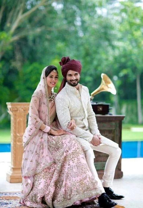 Coordinated outfits, Tips for Couple outfits | Bride Meera ragout wears a pink lehenga and groom shahid Kapoor wearing a deep Burgundy matching saafa Coordinates Outfits, Groom Dress Men, Indian Groom Wear, Wedding Dresses Men Indian, Indian Wedding Photography Couples, Couple Wedding Dress, Indian Bride Outfits, Indian Wedding Couple, Indian Wedding Photography Poses