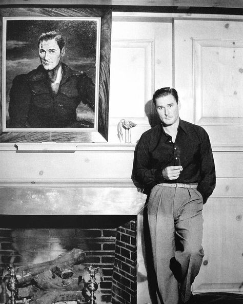 Old Hollywood on Instagram: “Errol Flynn in his den at Mulholland Farm, 1943. The painting was done by artist and friend, John Decker. "I think I liked my den best of…” Klasik Hollywood, Captain Blood, Errol Flynn, Olivia De Havilland, Hollywood Men, Classic Movie Stars, Old Hollywood Stars, Hollywood Icons, Old Hollywood Glamour