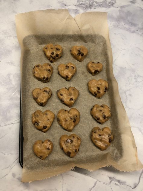 #cookies #cooking #heart #trendy #aesthetic #tiktok #art Baking Cookies Aesthetic Couple, Aesthetic Chocolate Chip Cookies, Heart Chocolate Chip Cookies Aesthetic, Baking Chocolate Chip Cookies Aesthetic, Heart Cookies With Jam Aesthetic, Heart Shaped Cookies, Heart Cookies, Shaped Cookie, Chip Cookies