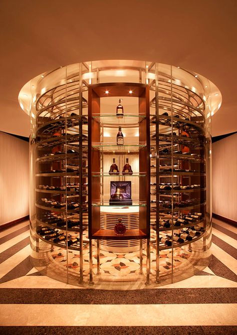 Wine Cabinet Design, Spiral Wine Cellar, Wine Shop Interior, Wine Room Design, Glass Restaurant, Ditsy Floral Blouse, Glass Wine Cellar, Metal Cabinets, Rose Gold Satin