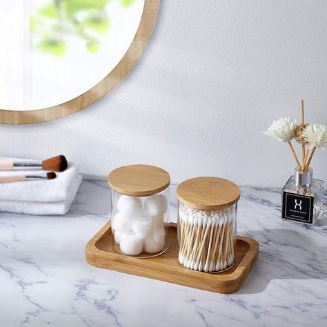 The bathroom vanity tray is made out of natural renewable bamboo, thick and sturdy. With smooth and attractive texture. the bamboo tray adds a natural look to any décor style. #home #design #decor #decoration #comfort #space #affiliate #style #usa #bathroom #organizer Holding Perfume, Bandeja Perfume, Apothecary Jars Bathroom, Q Tip Holder, Bathroom Jars, Bathroom Canisters, Bathroom Containers, Bathroom Vanity Tray, Candles Jewelry