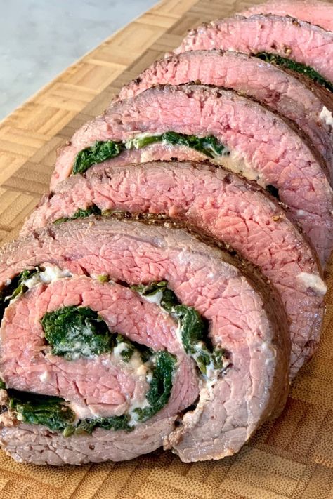 Flank Steak Stuffed, Stuffed Flank Steak, Flank Steak Recipes, Garlic Spinach, Grilled Dinner, Holiday Meal, Holiday Meals, Supper Recipes, Potluck Recipes