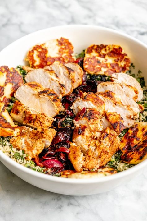 This Mediterranean Chicken recipe is finger-licking good and so easy to prepare. Serve with golden halloumi and fresh tabbouleh for a mouth-watering meal. Ingredients Red onion Lemon Olive oil Garlic Paprika Ground allspice Ground nutmeg Chicken breast Mint Parsley Spring onion Cucumber Couscous Halloumi Salt and pepper Full Recipe Here: https://thedinner.app/mediterranean-chicken-and-tabbouleh/ Nutmeg Chicken, Mediterranean Chicken Breast, Couscous Chicken, Chicken And Halloumi, Mediterranean Chicken Recipes, Couscous Recipes, Olive Oil Garlic, Chicken Breast Recipe, Lemon Olive Oil