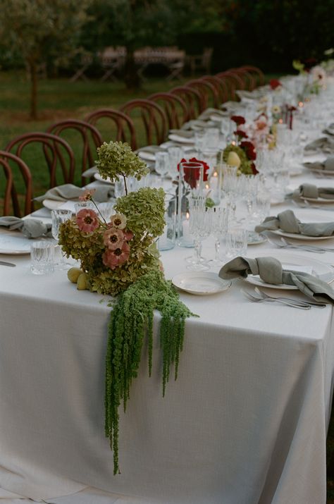 Real Wedding | April & Andrew One Long Table Wedding, Subtle Tropical Wedding, Backyard Wedding Tablescape, Plants As Wedding Centerpieces, Romantic Garden Party Wedding, Table Lamps Wedding, Formal Wedding Table Settings, Eclectic Wedding Table Settings, Potted Flowers Wedding