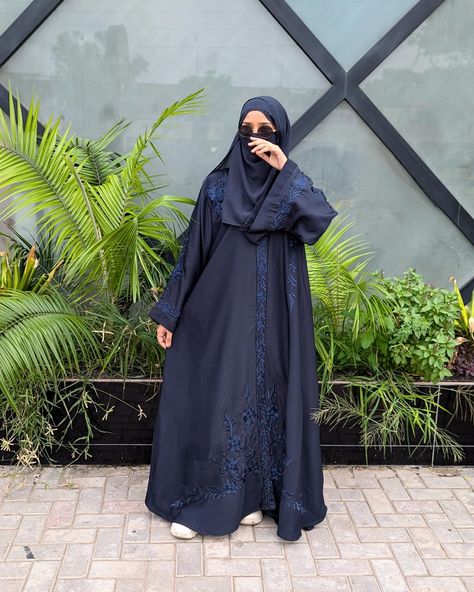 🌙 Elevate your wardrobe with our luxurious Blue Embroidered Abaya! ✨ Crafted with intricate embroidery, this abaya is the perfect blend of elegance and modesty. The deep navy hue, paired with detailed craftsmanship, makes it ideal for both casual and formal occasions. Step out in style and confidence! 💫 Available now at [your store name]! Don't miss out on this timeless piece. 💙" BlueAbaya #EmbroideredAbaya #ModestFashion #ElegantWear #HijabStyle #AbayaFashion #ModestWear #NimahBoutique #N... Navy Blue Abaya, Embroidered Abaya, Blue Abaya, Modest Wear, Intricate Embroidery, Abaya Fashion, The Deep, Formal Occasion, Hijab Fashion