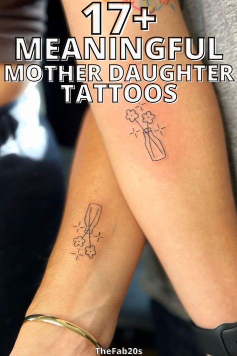 Matching mother-daughter tattoos featuring simple line art of a small vase holding flowers, symbolizing a shared bond and growth. Tattoo Ideas For Mom And Two Daughters, Wrist Tattoos For Mother And Daughter, Mother And Daughter Heart Tattoos, Daughter Tattoo For Mother, Minimalist Tattoo For Daughter, Meaningful Mother Tattoos, Mom And Daughter Birth Flower Tattoo, Mother Daughter Tattoos Birth Flowers, Mother Sister Daughter Tattoo