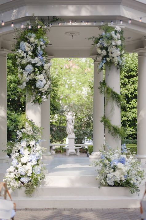 duiaandjean.com Column Decor Wedding, White And Blue Wedding Decorations, Wedding Decorations Blue And White, Blue Wedding Altar, Elegant Southern Wedding Ideas, Wedding Ceremony Gazebo, Flowers Church Wedding, Blue Florals Wedding, Front Porch Wedding