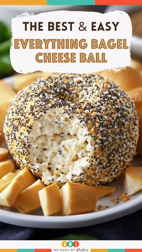 This Everything Bagel Cheese Ball is a savory, creamy appetizer bursting with everything bagel flavor! With cream cheese, Cheddar, and a crunchy coating of poppy seeds, sesame, garlic, and onion, this cheese ball is sure to be a hit at any gathering. Perfect with bagel chips or fresh veggies. Save this recipe to try for your next party! Cheese Ball Green Onion, Cheese Ball Everything Bagel, Everything Cheese Ball Recipes, Everything But The Bagel Recipes, Savory Cheese Ball Recipes, Bruschetta Cheese Ball Recipe, Everything Cheese Ball, Homemade Cheese Ball Recipes, Everything Bagel Cheeseball