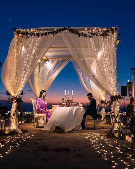 #MPIRE #AHDStudioBH  #beachside #proposal #engagement #happywedding #ring #smile #surprise Beach Proposal At Night, Dinner Proposal Engagement, Dinner Proposal Ideas, Arab Proposal, Proposal Table Decor, Proposal Dinner Ideas, Dream Proposal Romantic, Proposal Dinner, Proposal Decorations