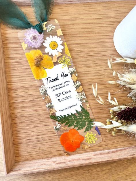 Pressed flower bookmarks for a school reunion! Class Reunion Favors, Pressed Flower Bookmarks, Reunion Favors, High School Class Reunion, College Reunion, Flower Bookmarks, Reunion Party, Do Not Conform, Bible Bookmark